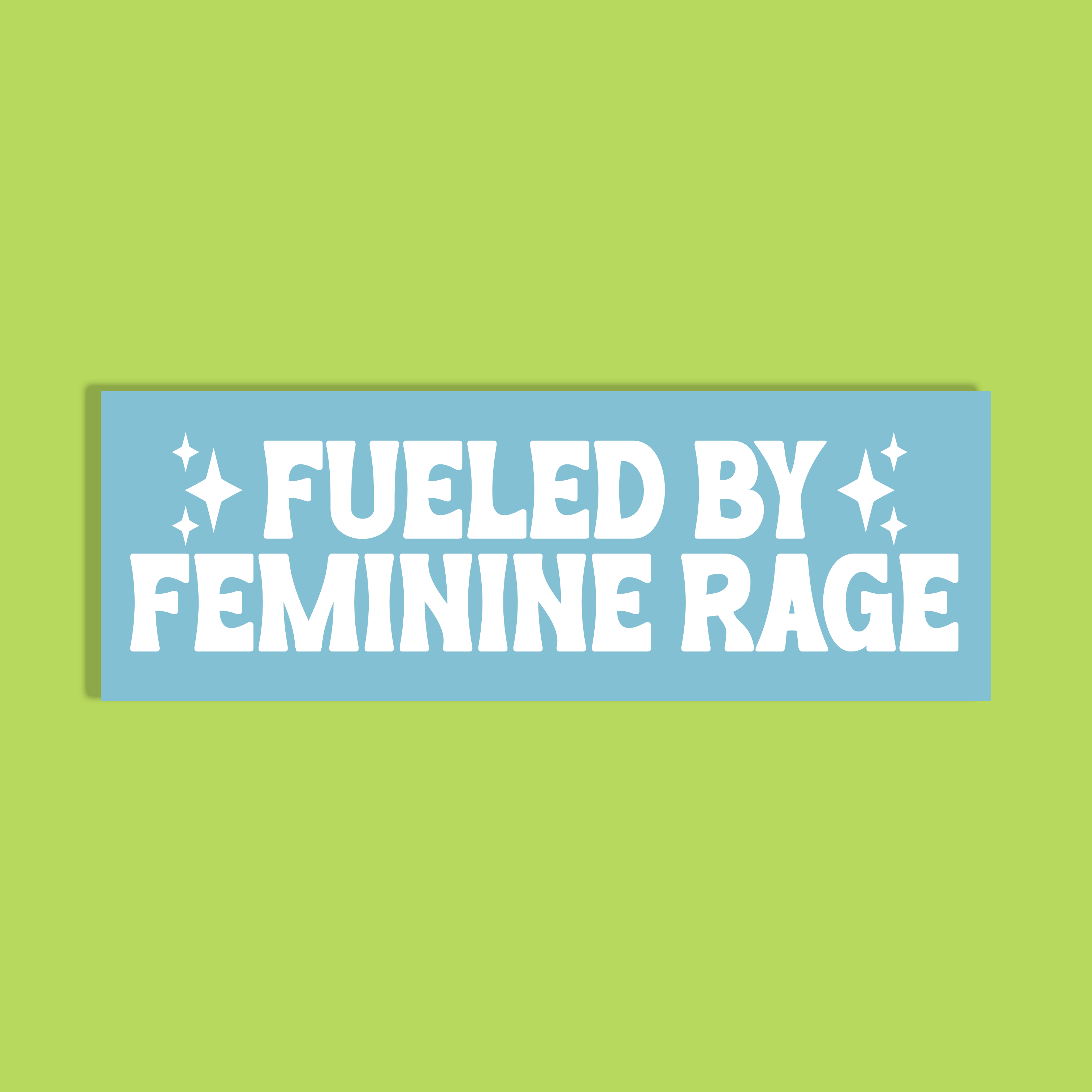 A light blue rectangle with bold white text reading 'FUELED BY FEMININE RAGE' with small star accents, shown on a solid lime green background.