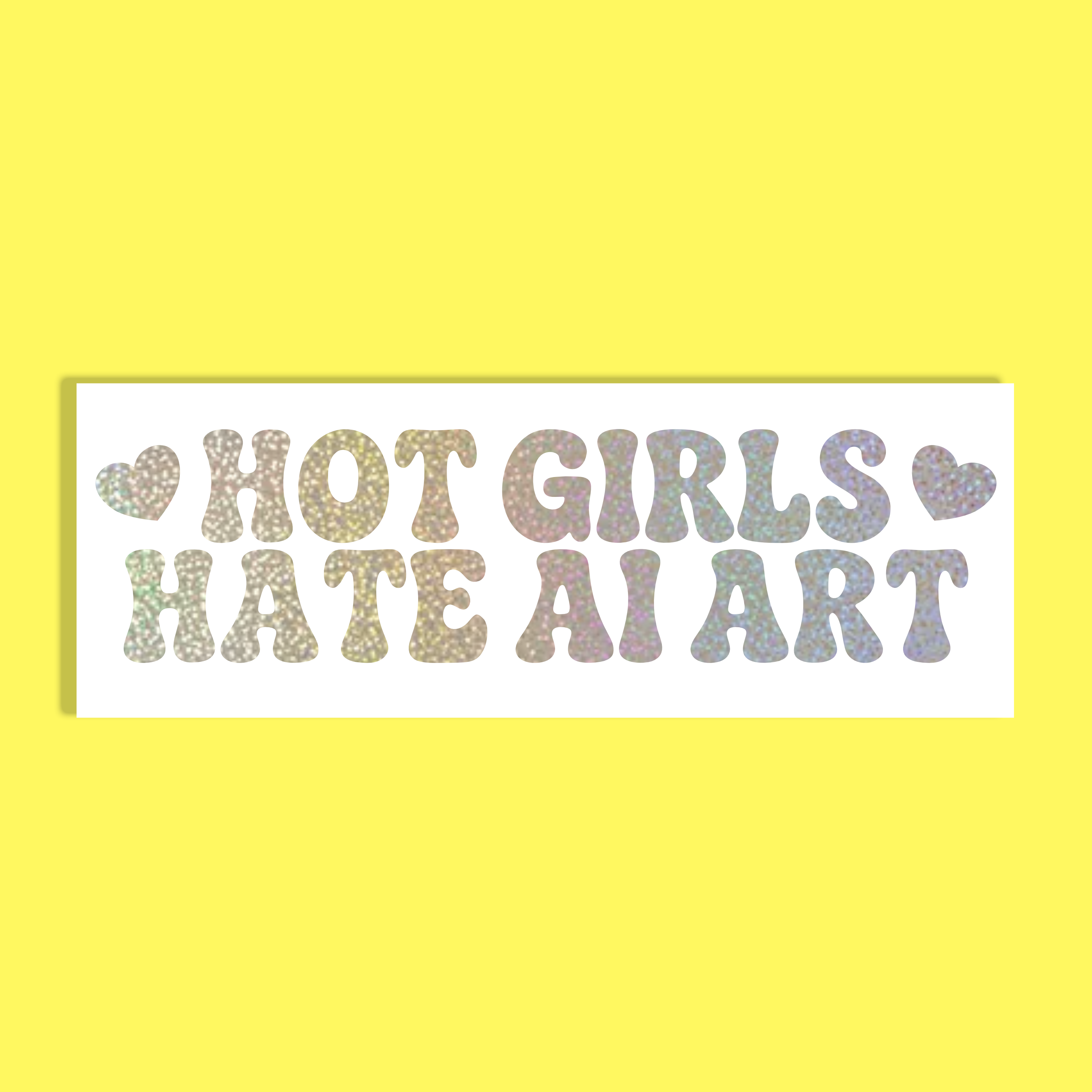 A rectangular white background with the phrase “HOT GIRLS HATE AI ART” in large silver holographic pastel letters, flanked by two small hearts, shown on a bright yellow background.