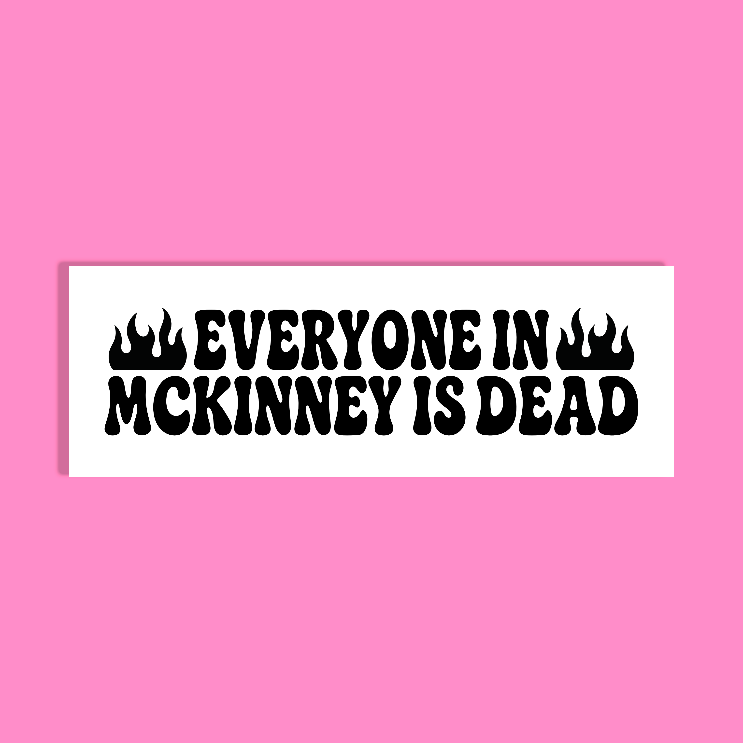 A rectangular white sticker or sign with bold black text reading “EVERYONE IN MCKINNEY IS DEAD,” centered on a solid pink background.