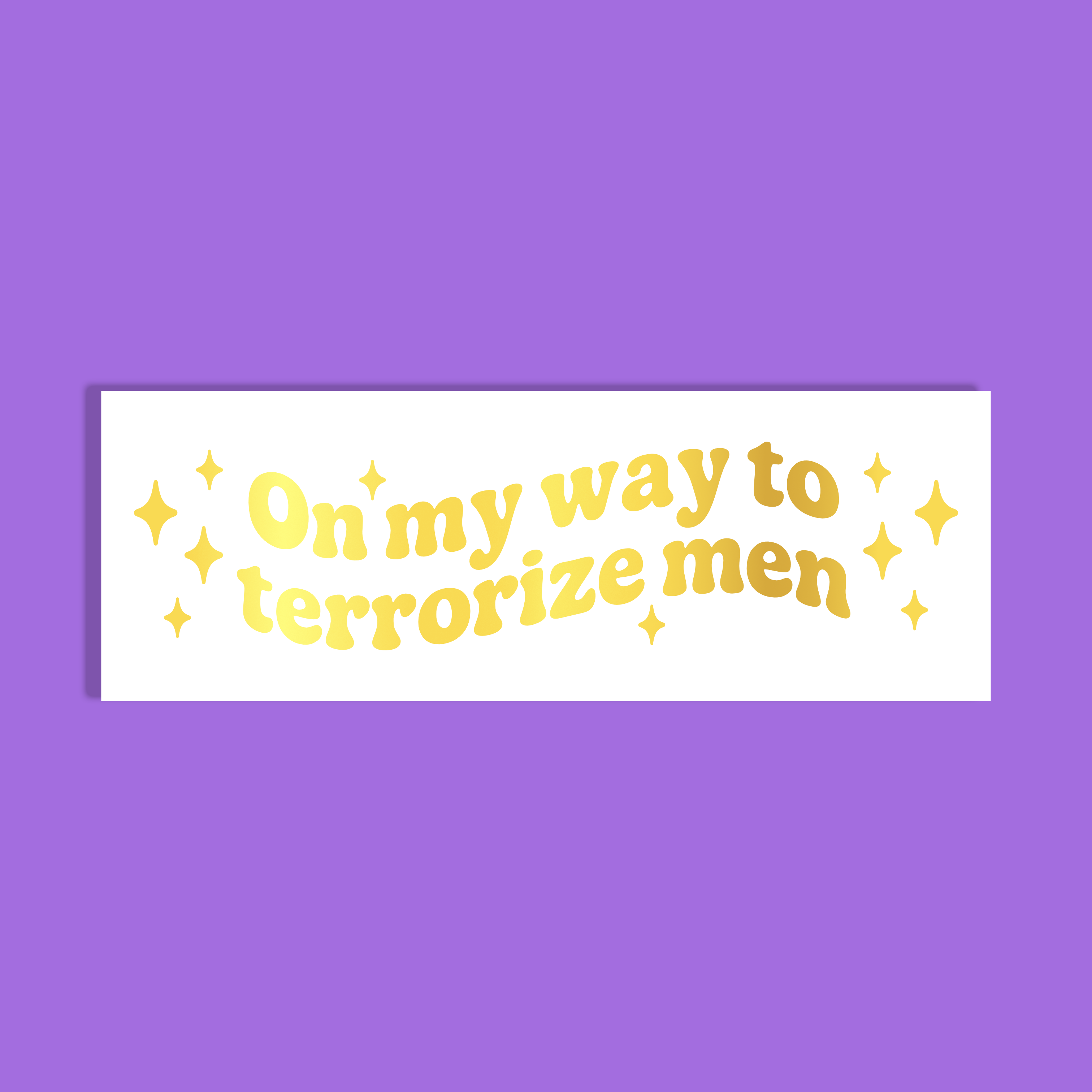 A white rectangle with gold retro-style text reading 'On my way to terrorize men' and small gold stars, shown on a solid purple background.