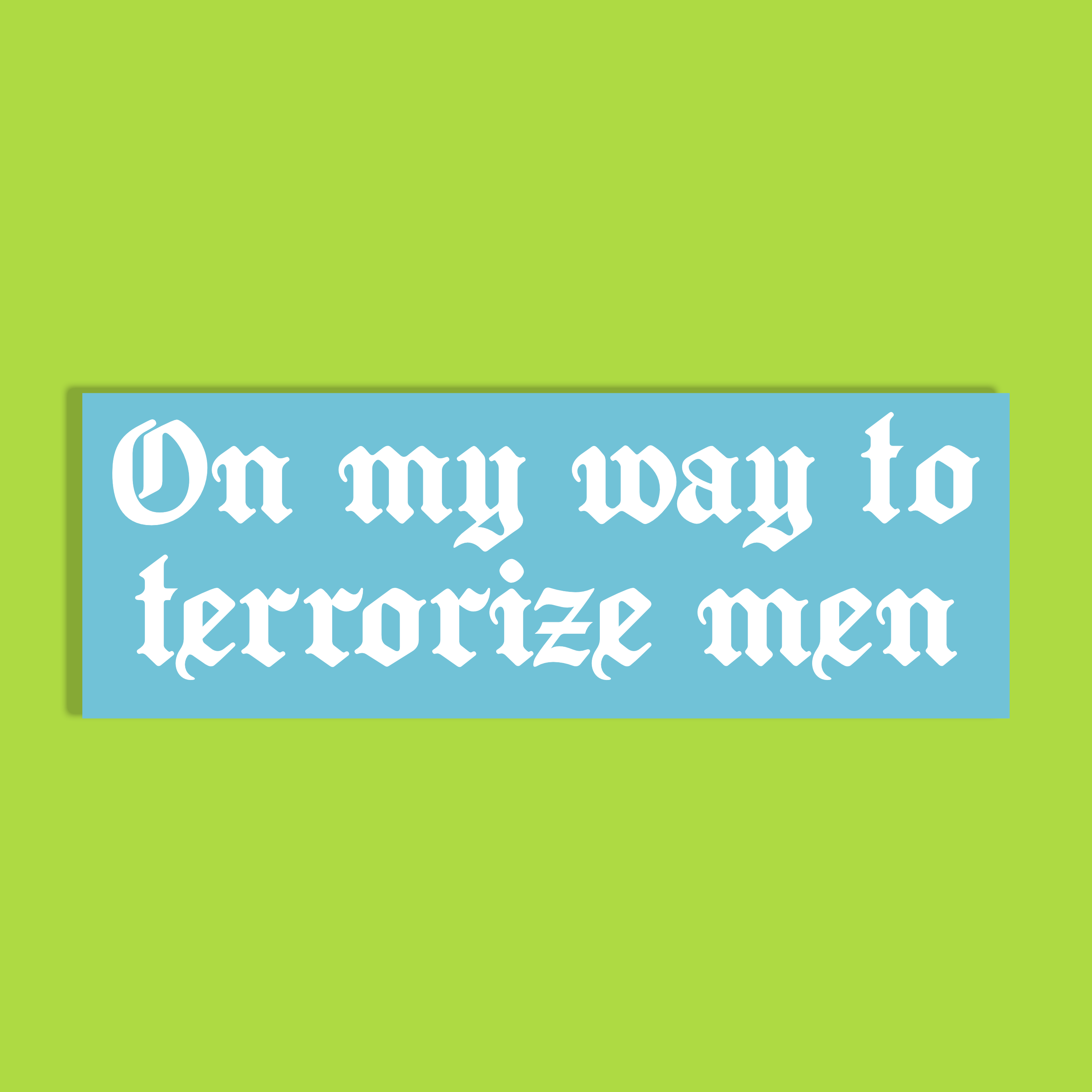 A rectangular light blue background with white Gothic-style text reading 'On my way to terrorize men' on a solid lime green background.