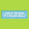 A rectangular light blue background with white glittery text reading 'THIS IS THE SKIN OF A KILLER, BELLA' and small white sparkle graphics, shown on a solid lime green background.