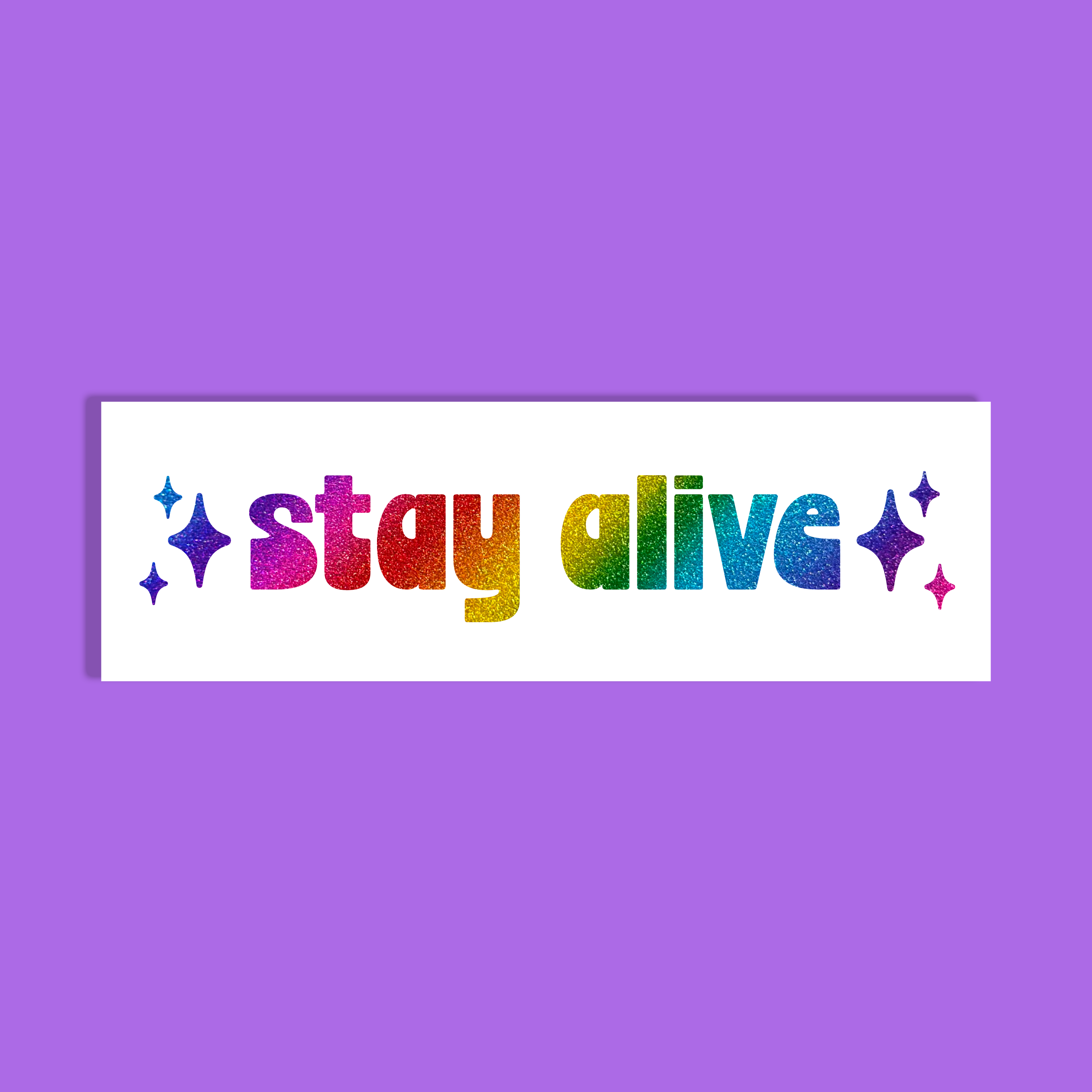 A rectangular white background with the phrase 'stay alive' in rainbow glitter-style lettering, centered on a solid purple background.