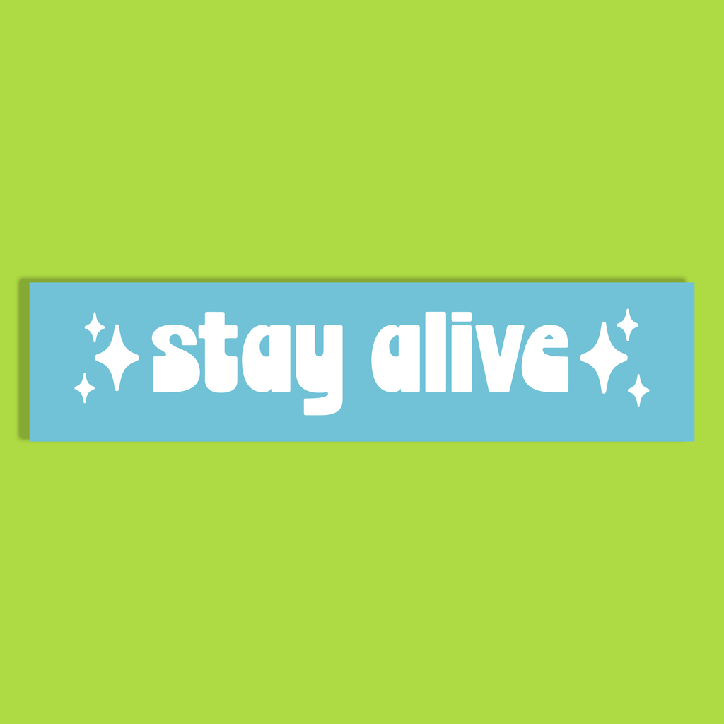 A rectangular light background with the phrase 'stay alive' in white retro-style lettering and white sparkle accents, shown against a solid lime green background.